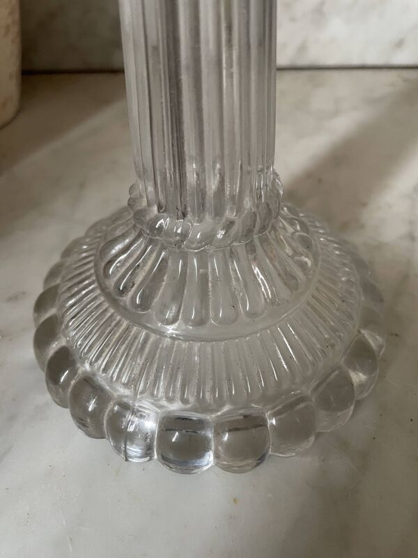 Lot d’anciens bougeoirs en verre