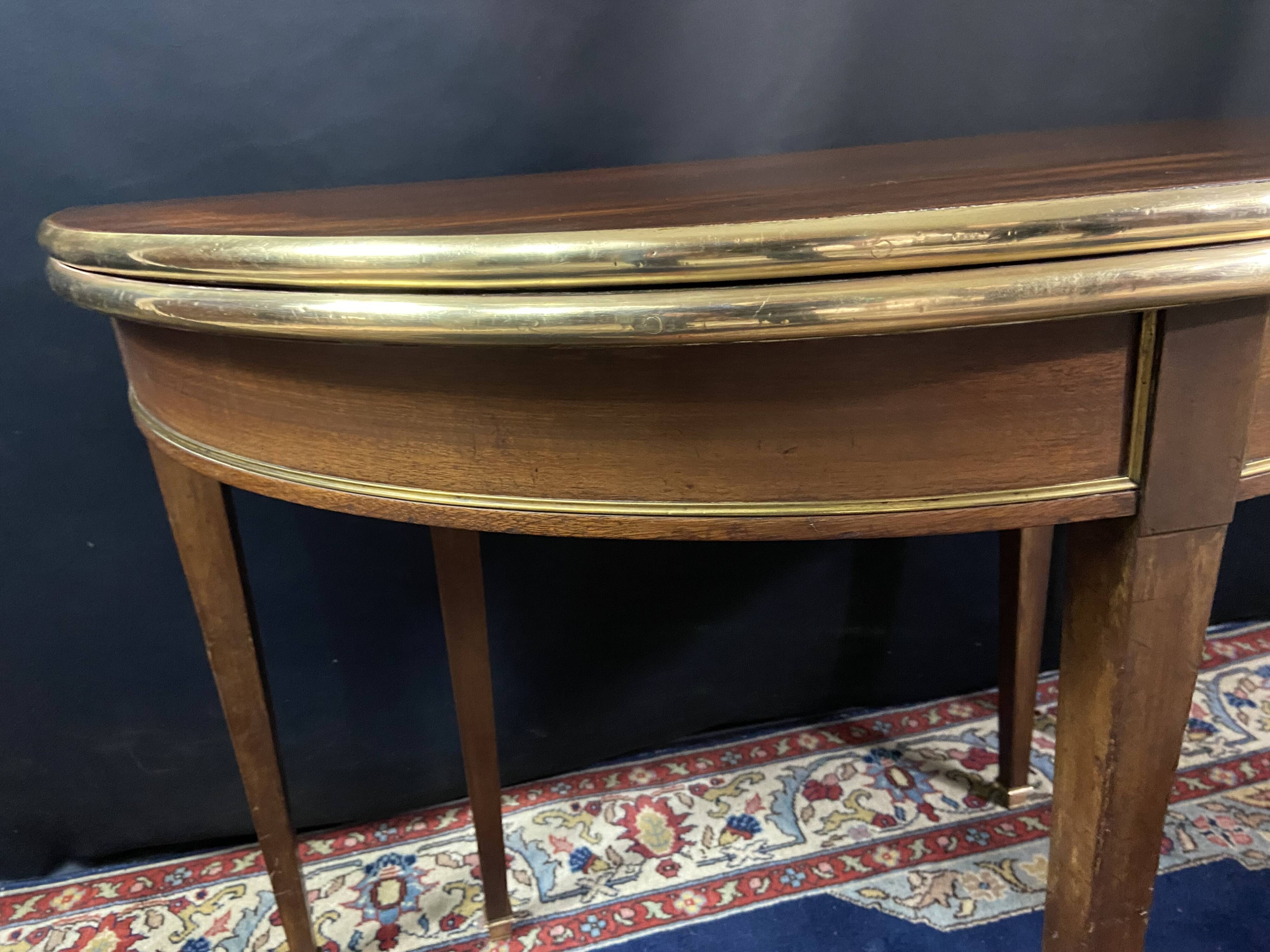 Console table demi-lune 19th century Louis XVI modular foldable top in mahogany.