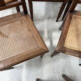 Art Deco table and six chairs in solid walnut, 20th century.