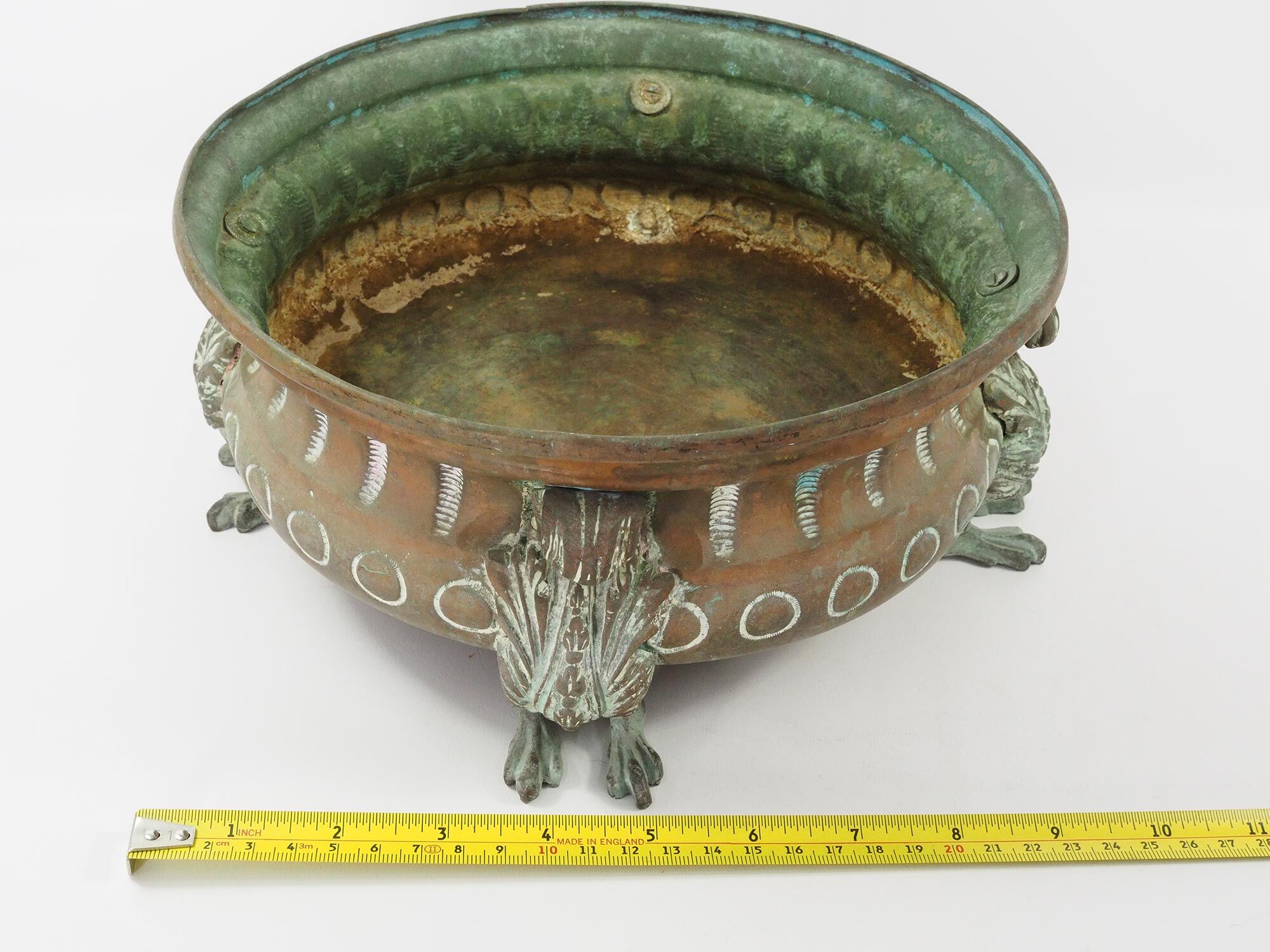 Repelled copper planter with acanthus and cast bronze legs, 1900s