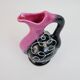 Black and pink Vallauris carafe with white relief patterns