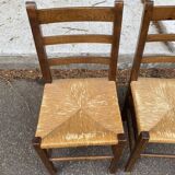 2 solid wood and straw chairs