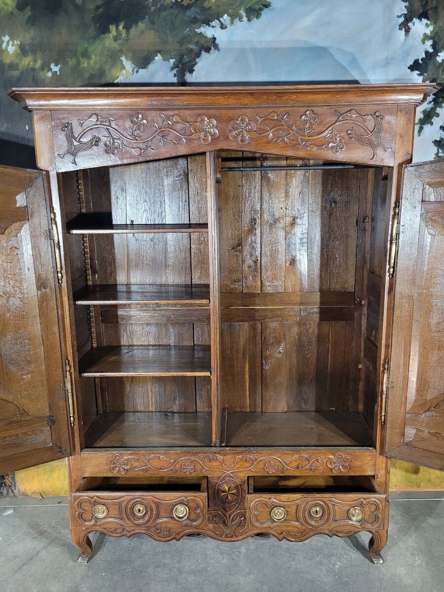 Louis XV carved oak wardrobe
