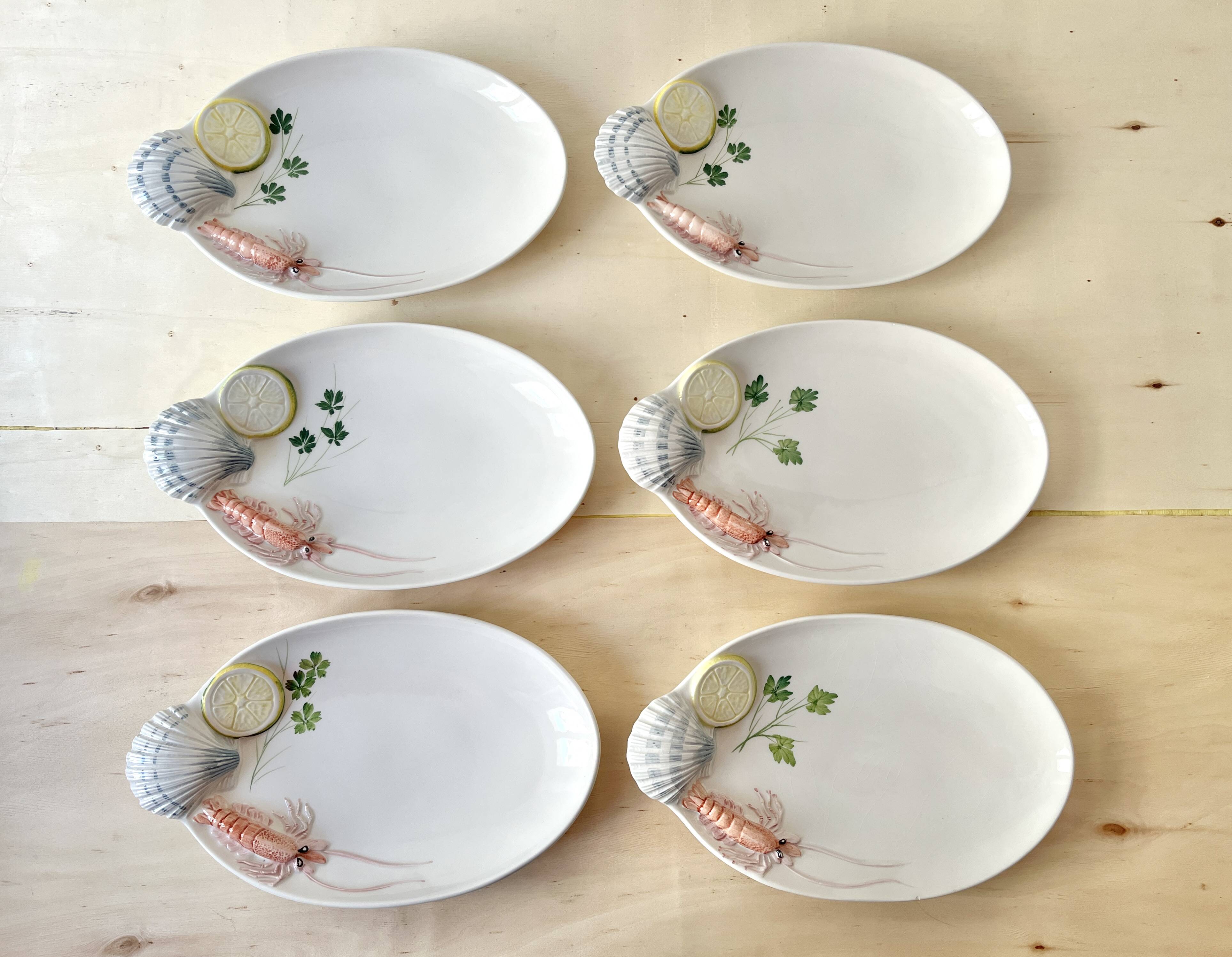 Vintage Italian majolica plates, seafood plates.