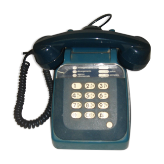 Old blue phone to keys of the 1970/1980