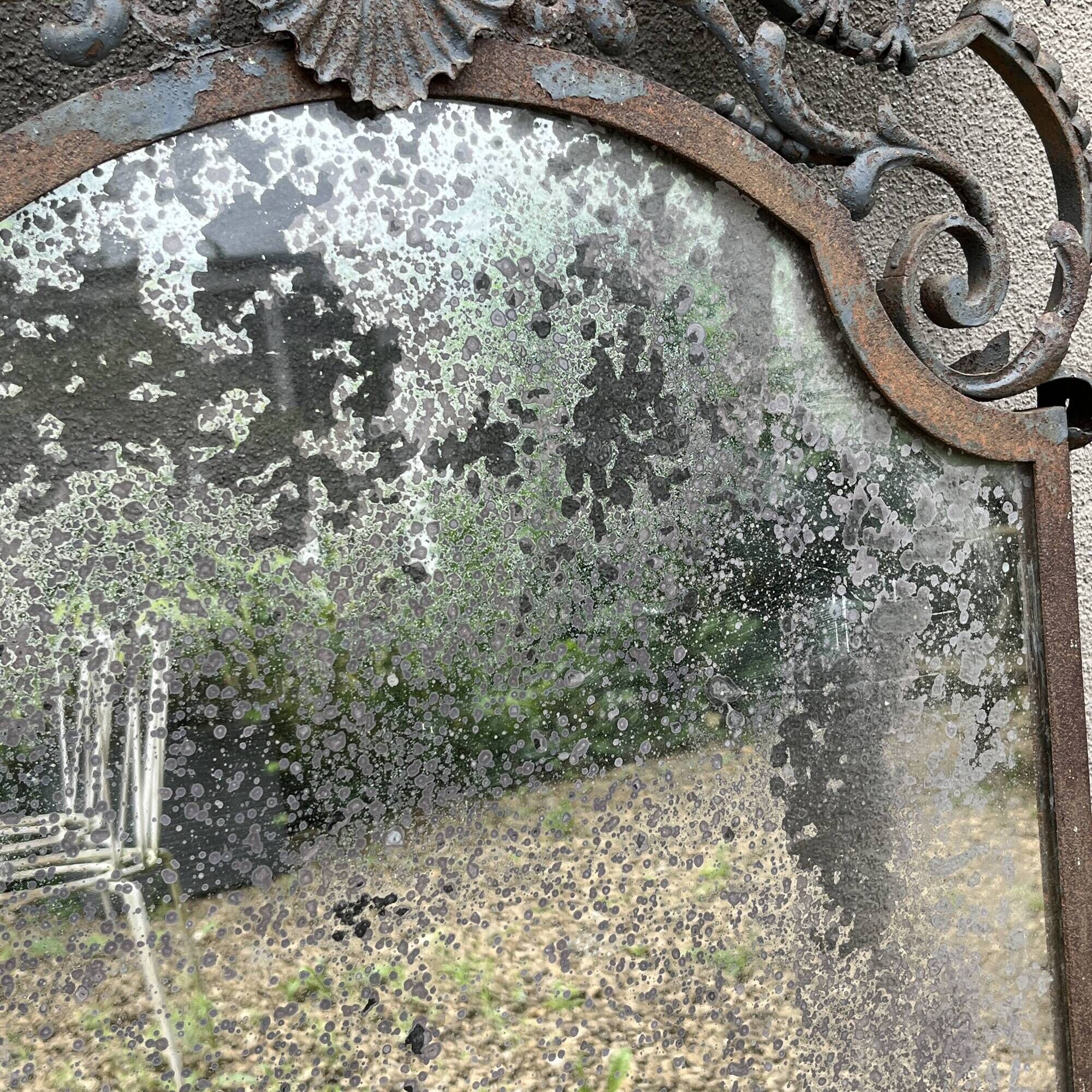 Art Deco wrought iron bird mirror in the style of Gilbert Poillerat, circa 1930