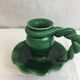 Old candleholder, glazed terracotta cellar, artisanal green color