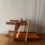 Old foldable beach seat in wood and canvas for children