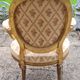 Paire de fauteuils médaillon en bois doré style Louis XVI