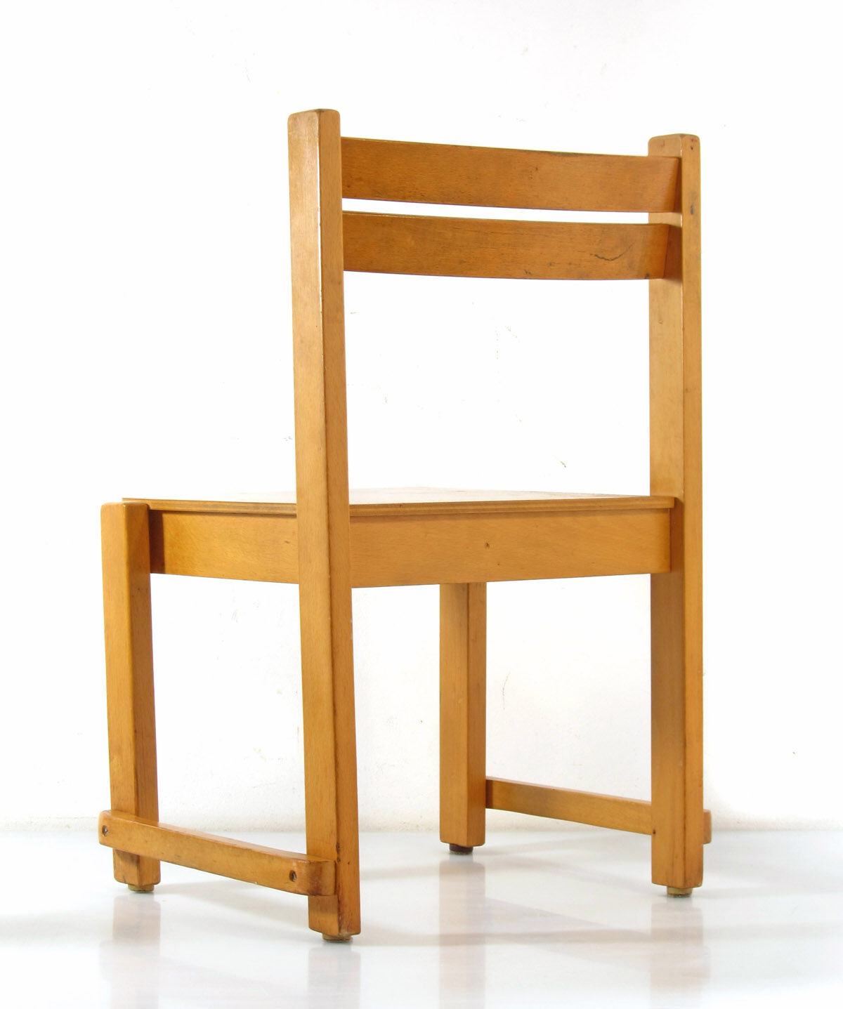 Children's chair in plywood in Scandinavian Danish style.