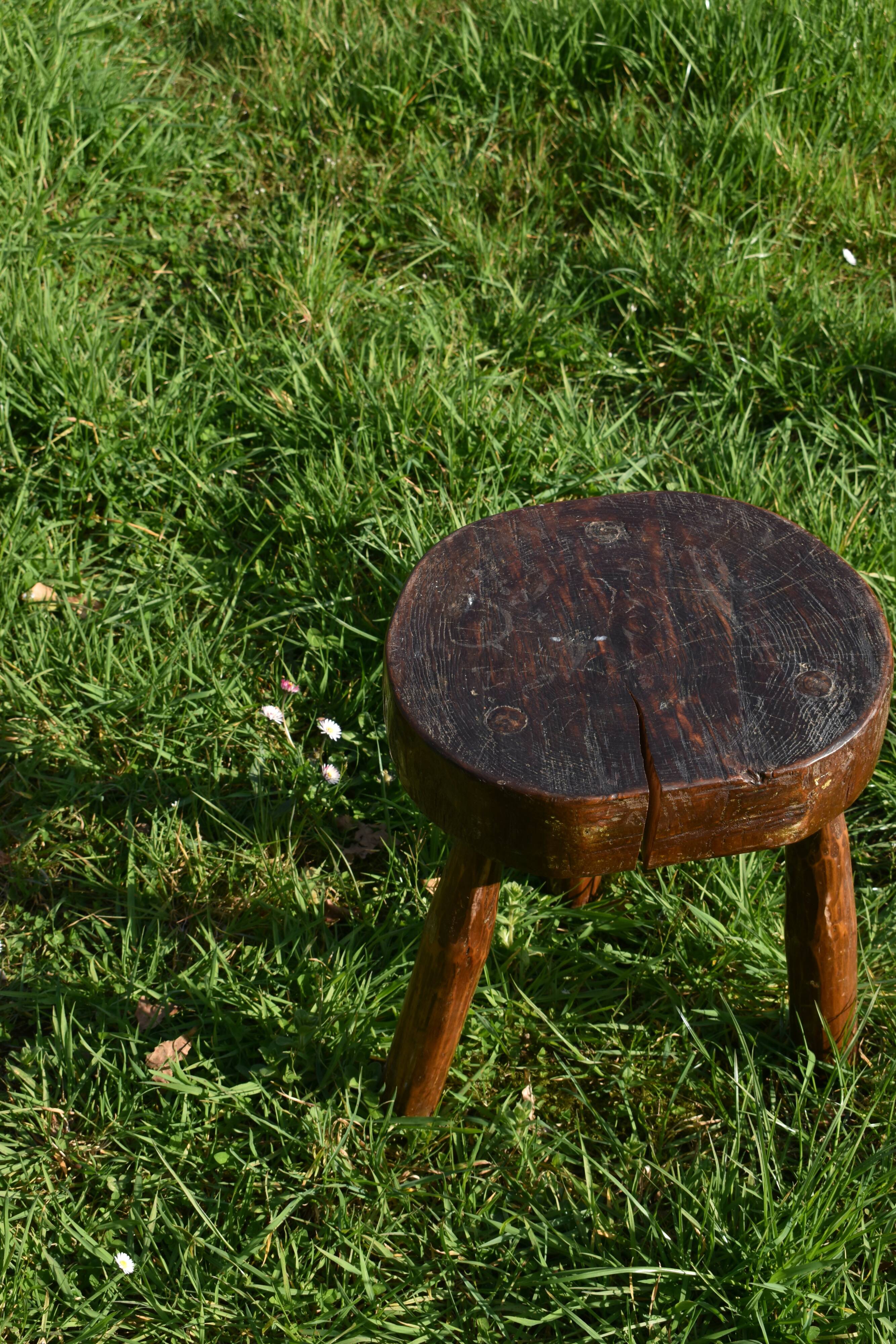 Ancient tripod brutalist stool