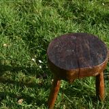Ancient tripod brutalist stool