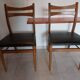 5 Scandinavian style chairs, wood and black faux leather.