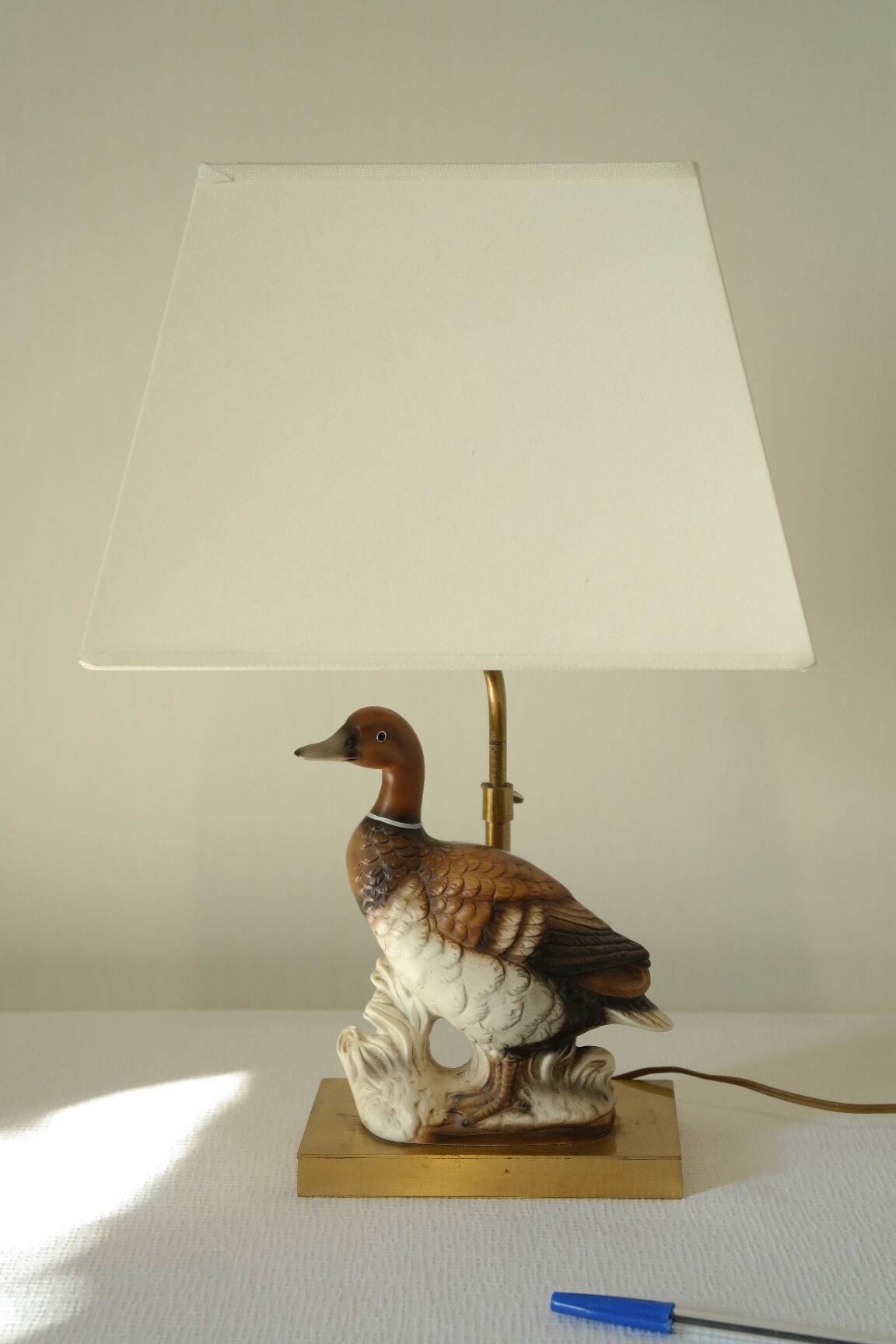 Ceramic duck table lamp and vintage adjustable brass