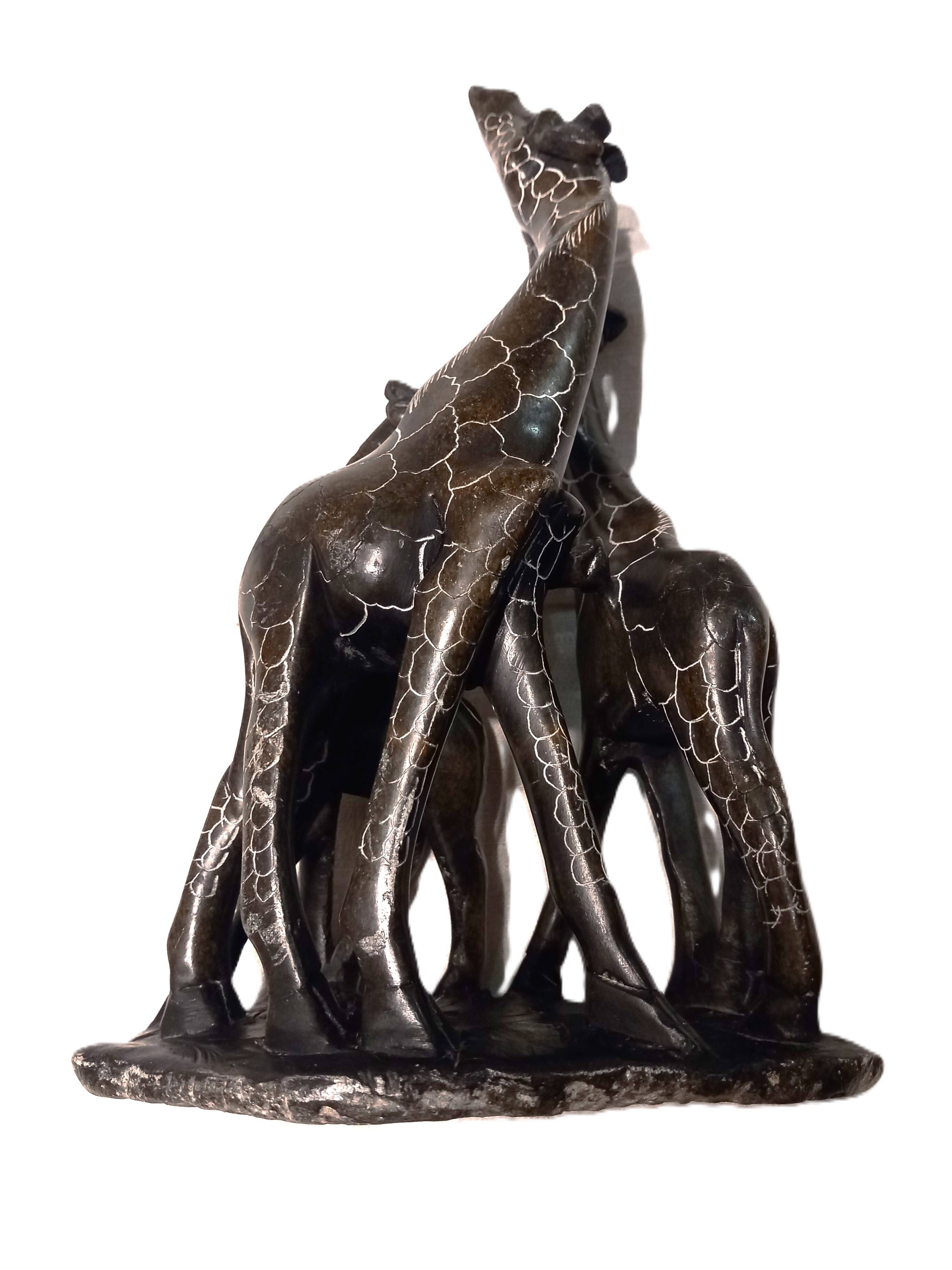 African stone sculpture of 3 Giraffes