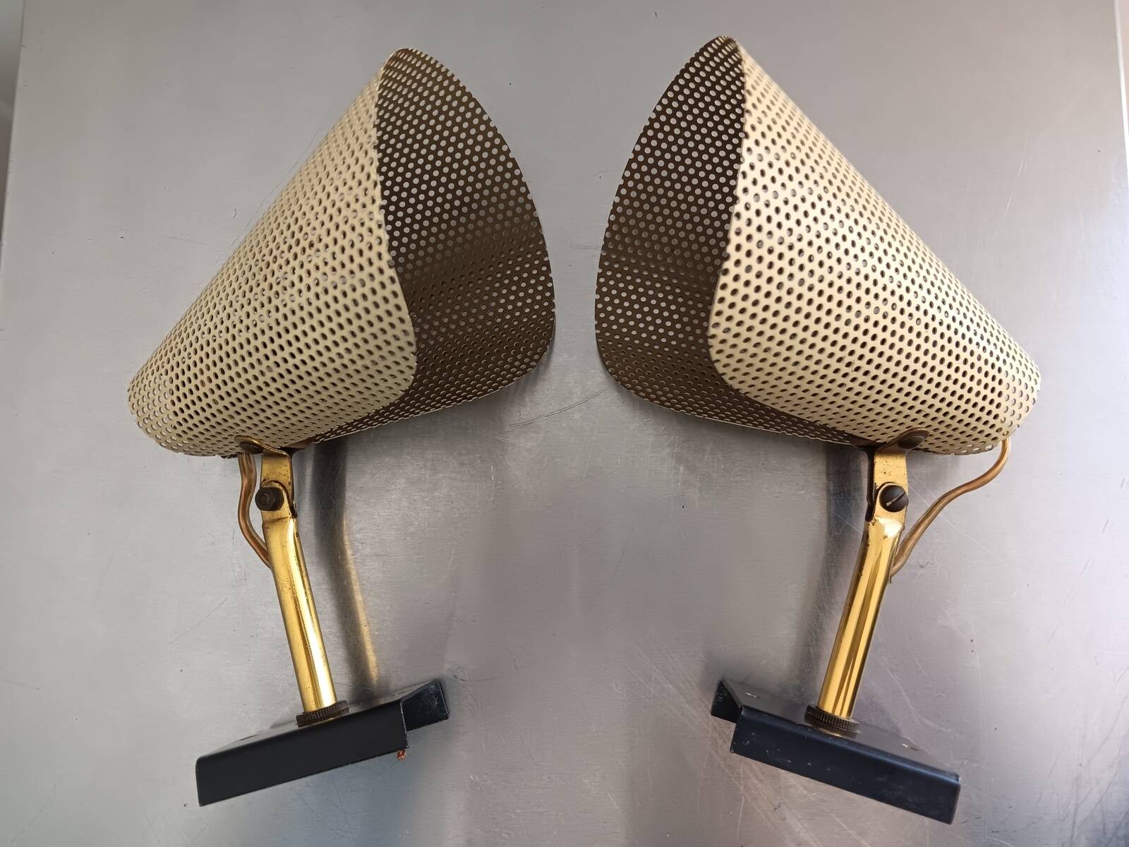Pair of perforated metal horn wall lights