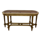 Banquette cannée dorée de style Louis XV