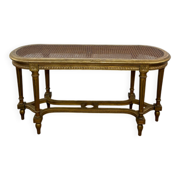 Banquette cannée dorée de style Louis XV
