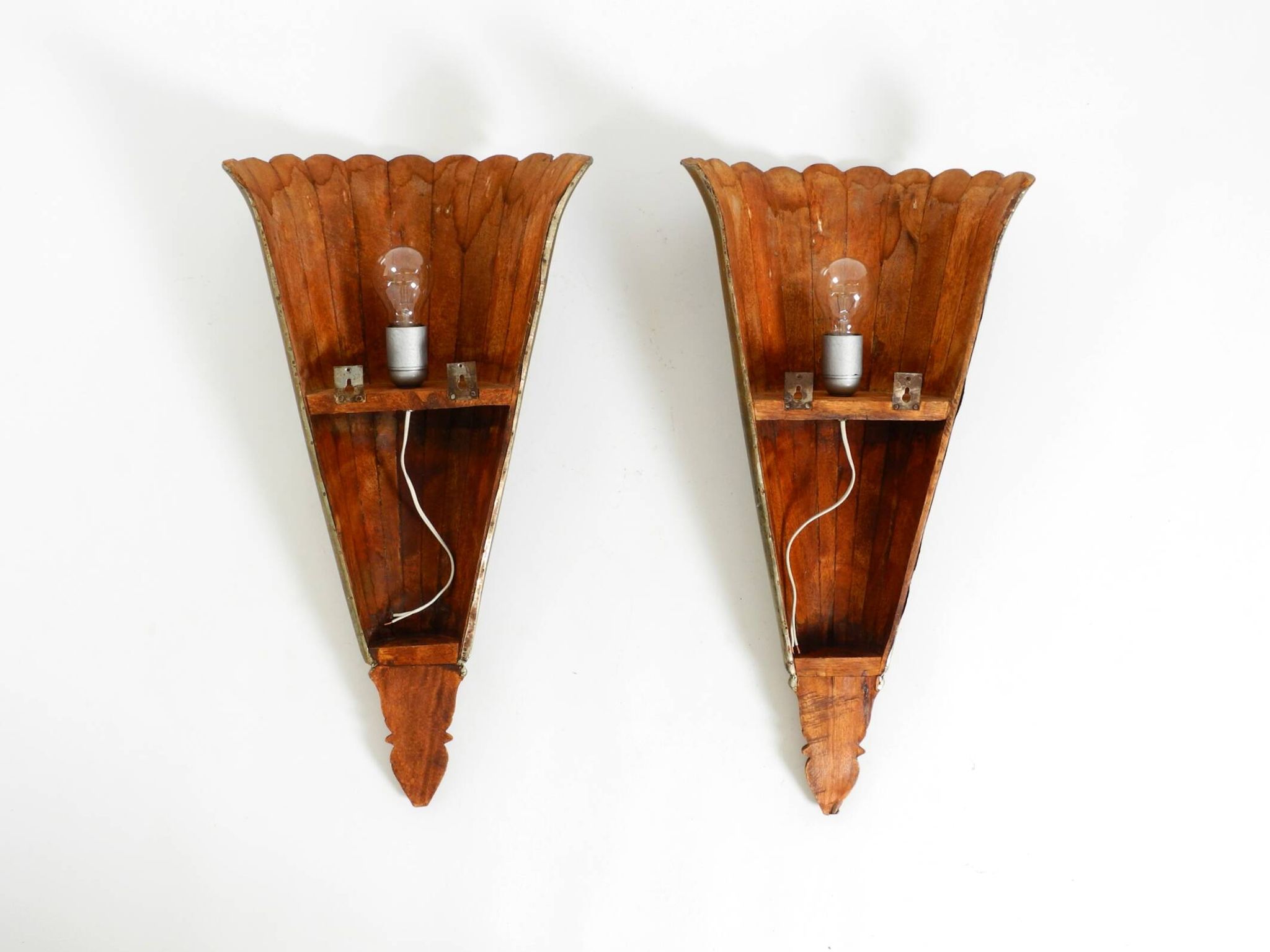 Two large, rare 1950s wall lamps made of wood with aluminum cladding