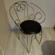 1960s brass and vinyl scroll chair