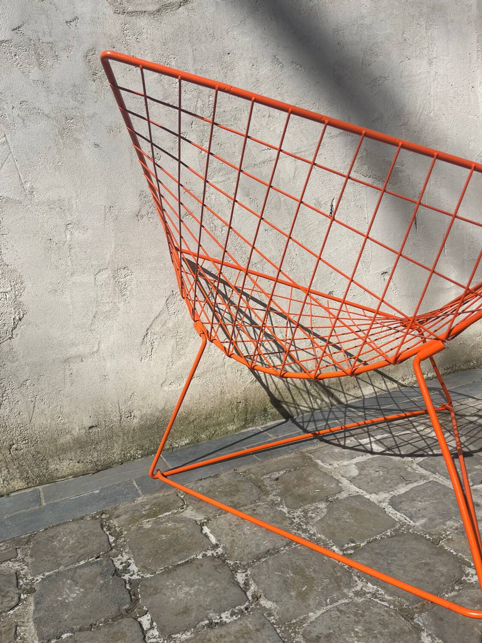 Orange lattice armchair