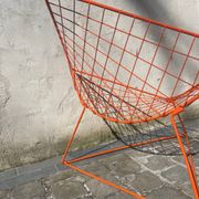 Orange lattice armchair