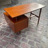 Mahogany desk with drawers by Jacques Hauville published by Bema.