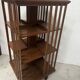 Rotating library in solid walnut, 20th century.