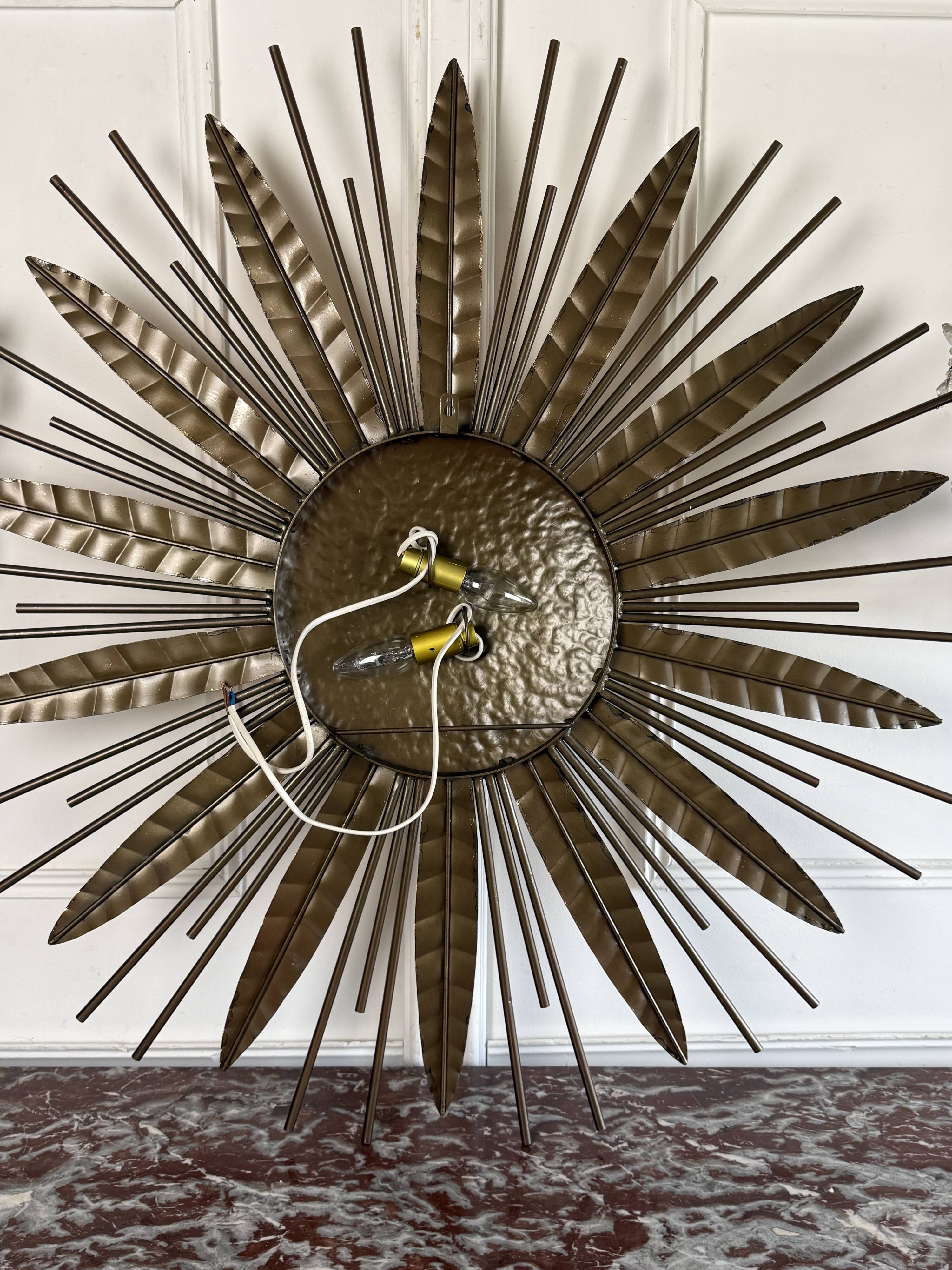 Large golden hammered metal sun wall light with a diameter of 90 cm from the year