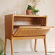 Meuble en bois et rotin pieds compas sur roulettes