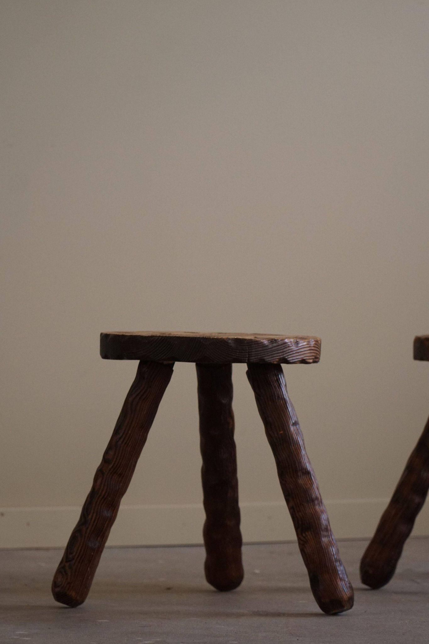 A pair of Wabi Sabi stools carved from pine, mid-century modern Swedish style, 1960s.