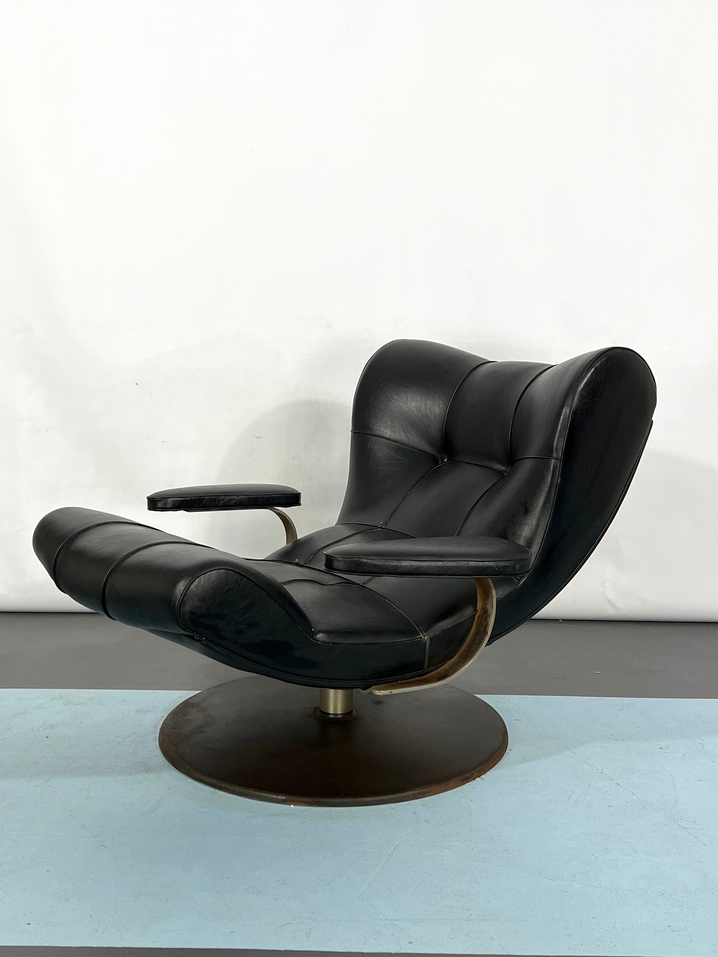 Vintage Italian black swivel armchair from 60s