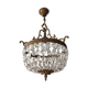 Old chandelier with bronze stamps