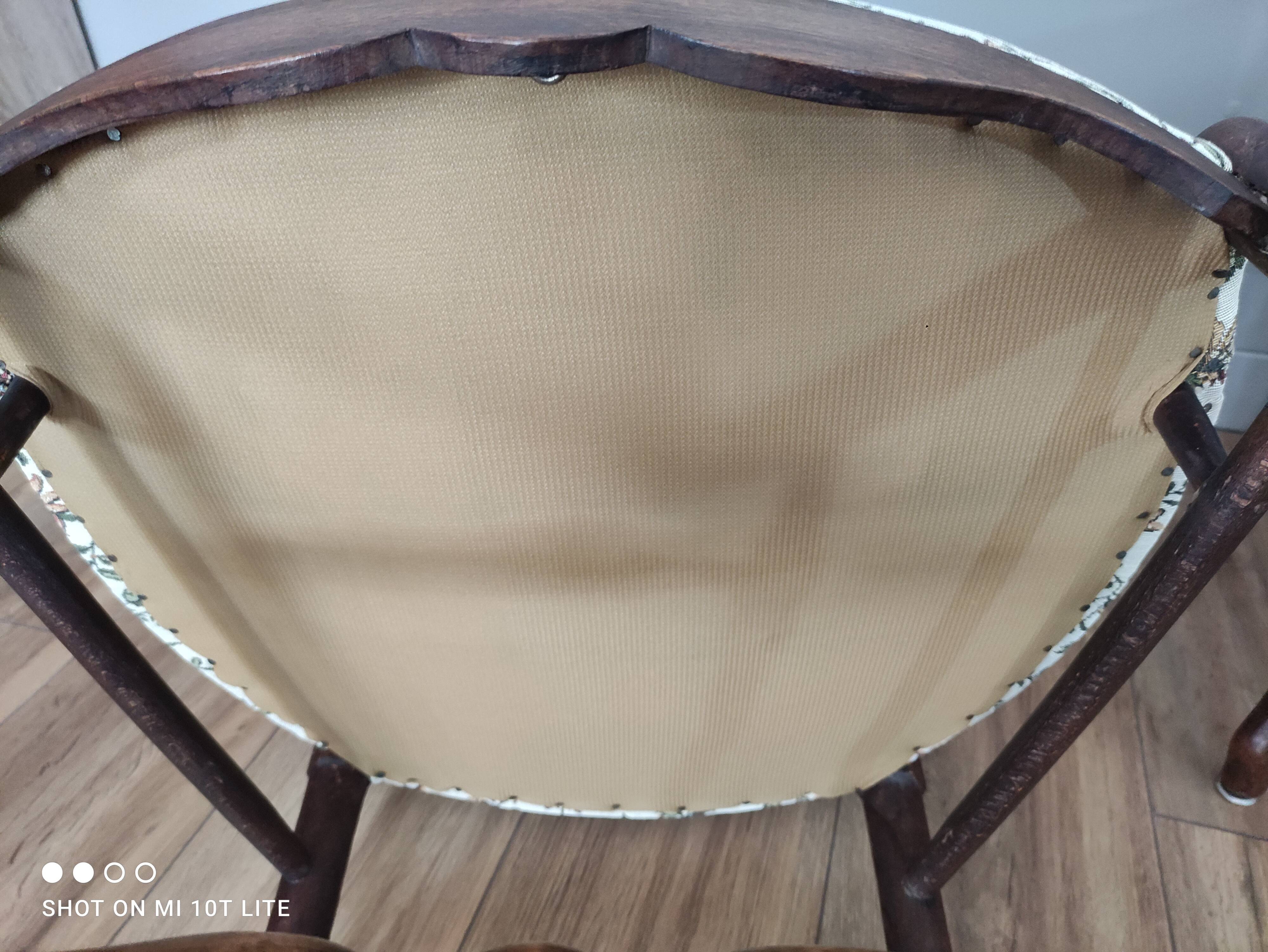 Pair of Provencal armchairs in brown wood and floral fabric