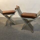 Pair of curule chairs designed by John Vesey, 1958, USA, brushed aluminum, walnut and leather