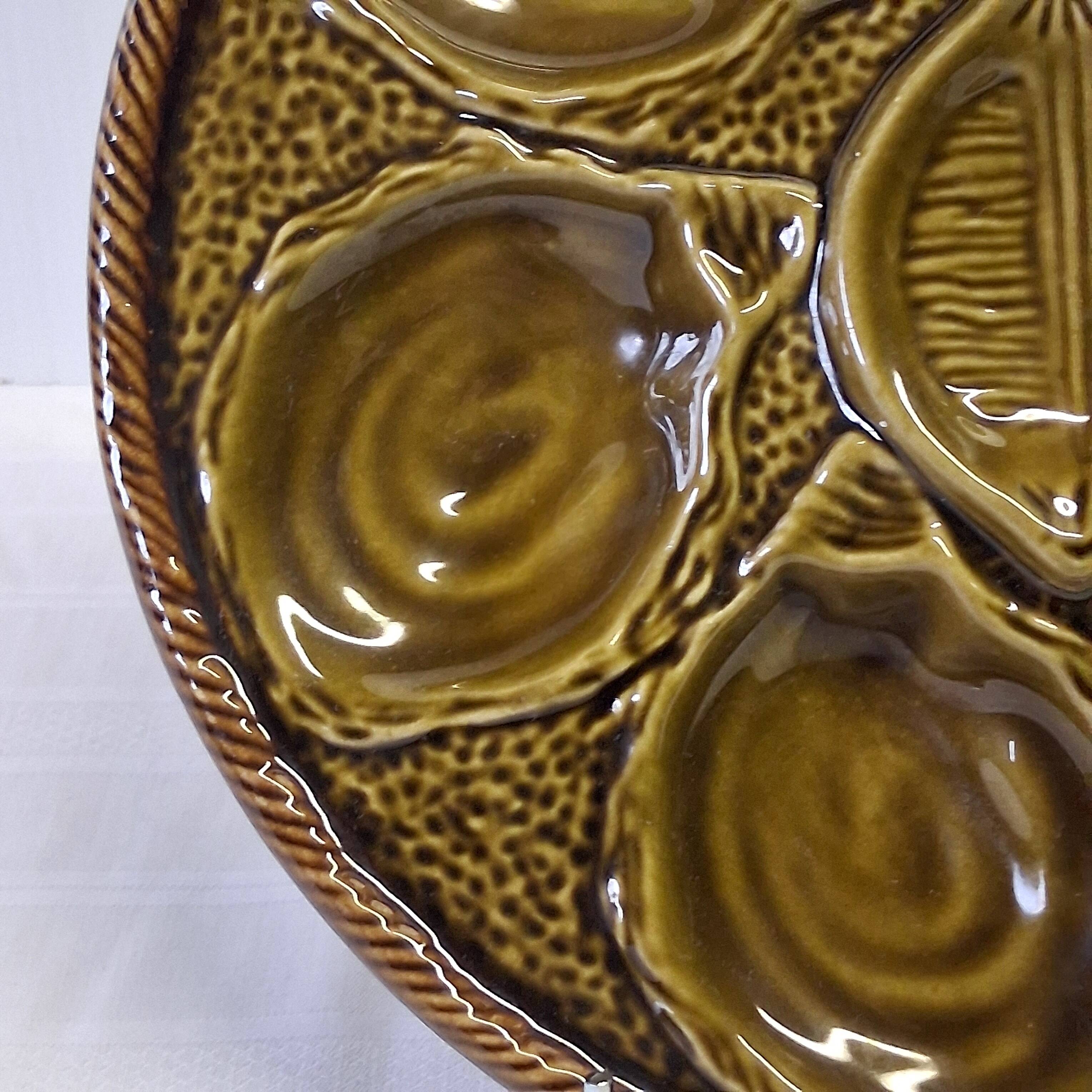3 green majolica oyster plates from St Clément in good condition.