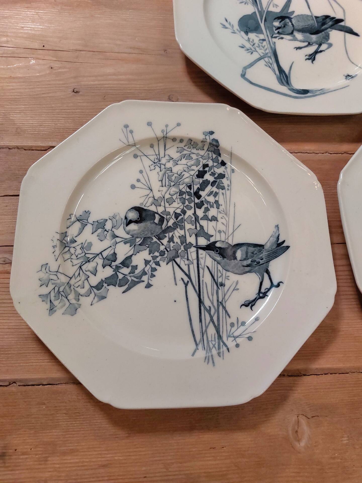 Set of three blue ironstone flat plates.