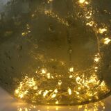 Old demijohn full of bubbles