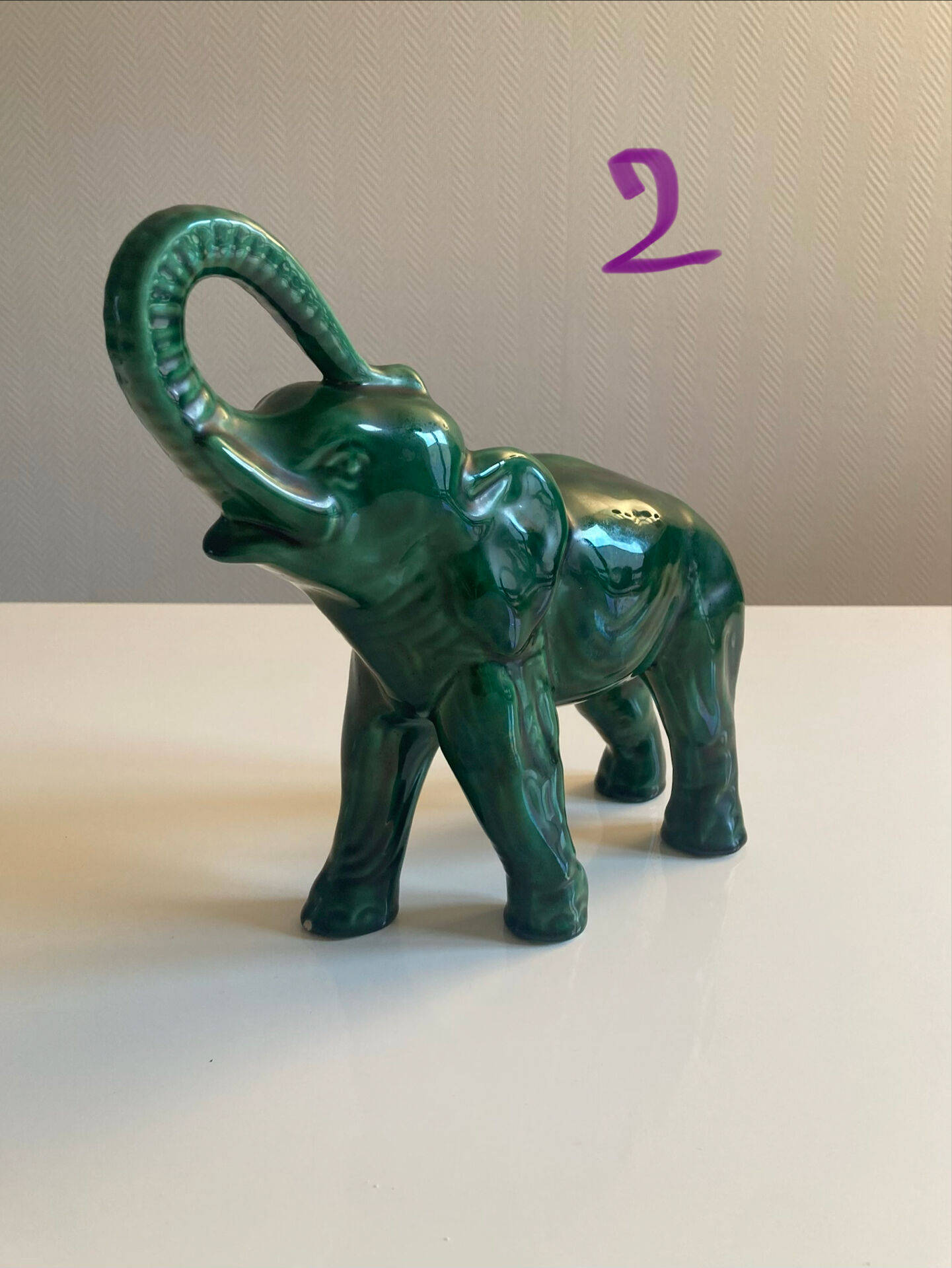 Pair of marbled faience elephants from Saint Clément