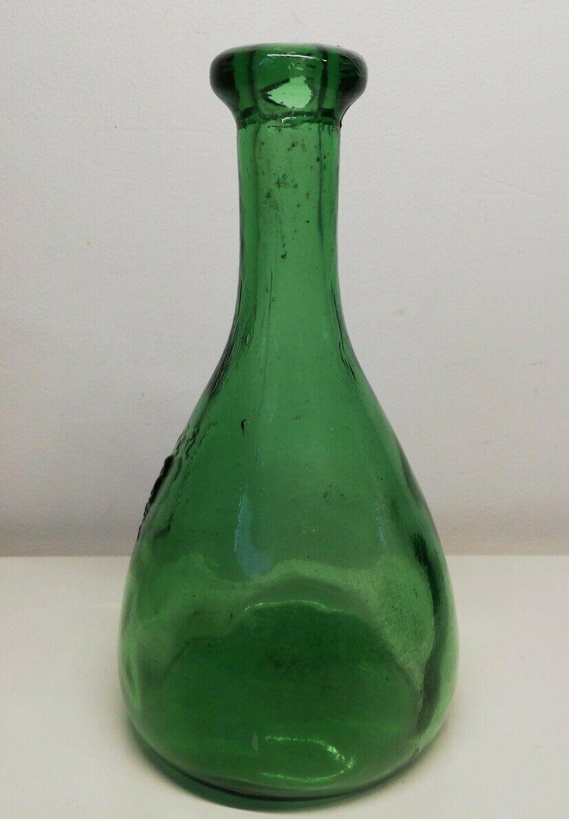 Glass bottles with coat of arms