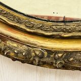Large golden oval mirror