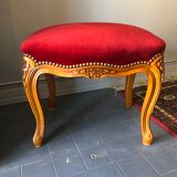 Old foot rest, red velvet