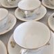 10 anciennes tasses à café avec soucoupes en porcelaine à motifs de fleurs dorées