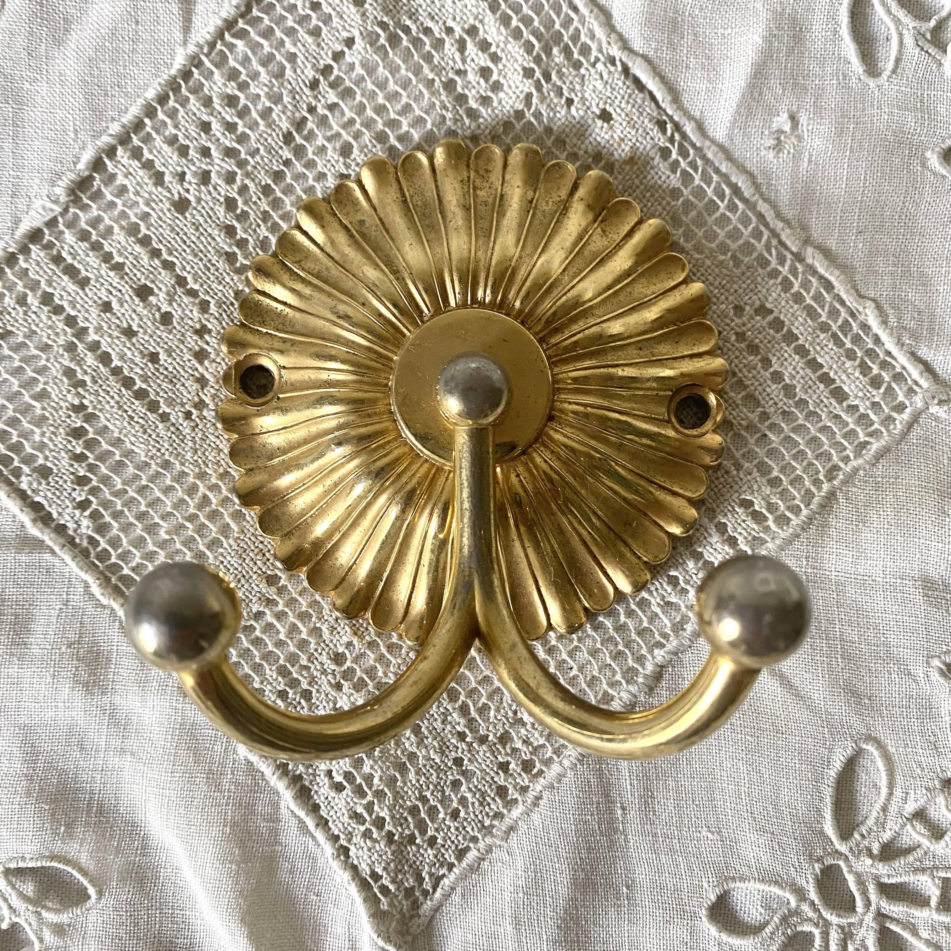 Coat hook, double hook in gold metal