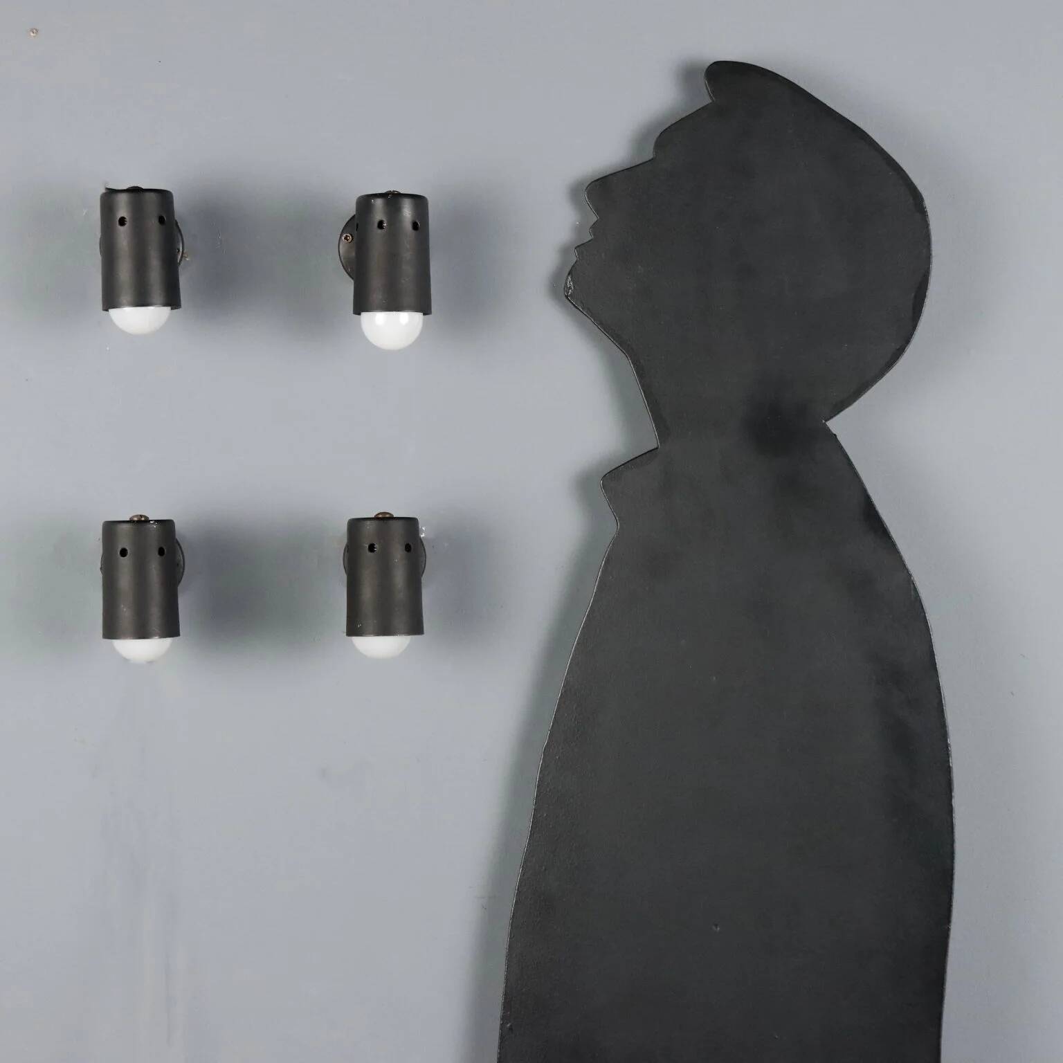 Adjustable black metal wall sconces from the 1960s.