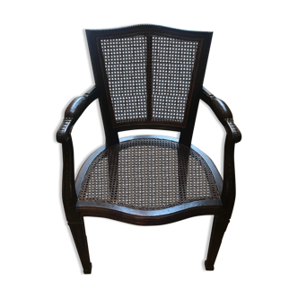 Office armchair in caned wood