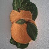 Orange trompe l'oeil slip dish.