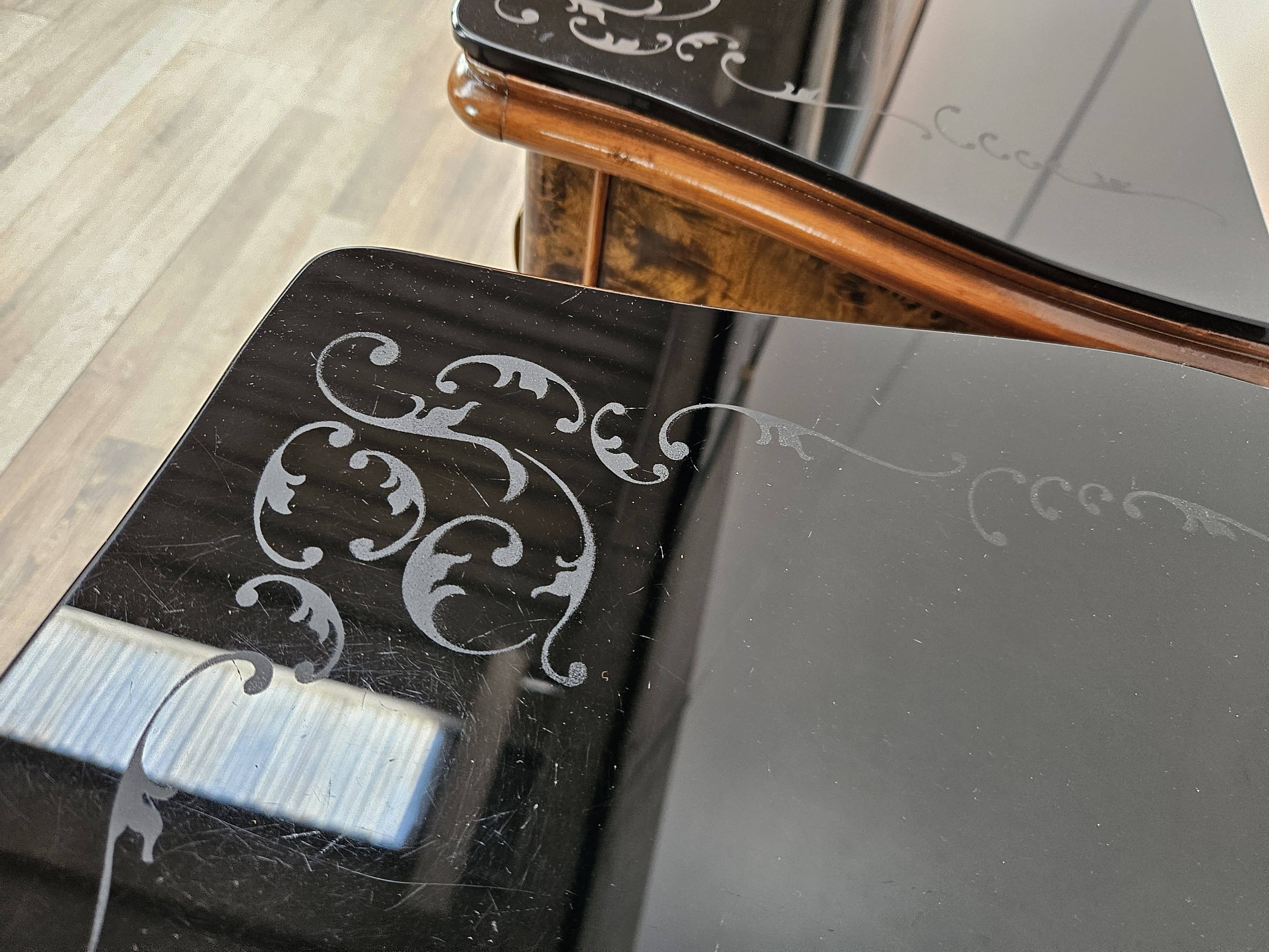 1950s Chippendale bedside tables with black glass