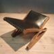 Tilting footrest