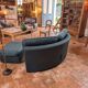 Chauffeuse angle vintage et son pouf
